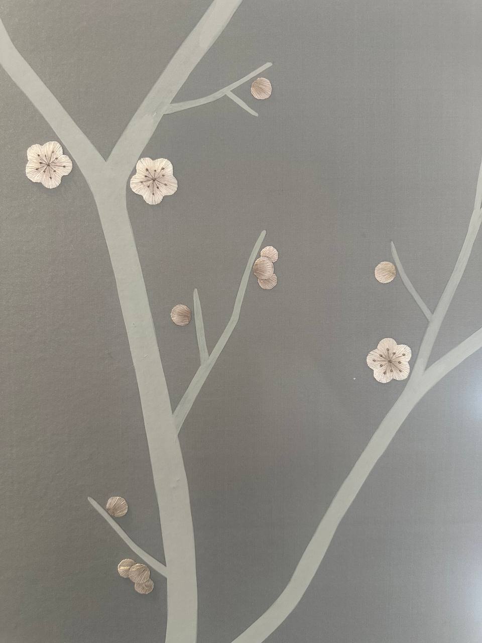 The chinoiserie wallpaper inside the boutique.